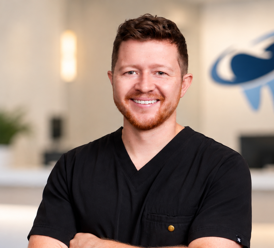 Smiling Dentist in Modern Clinic